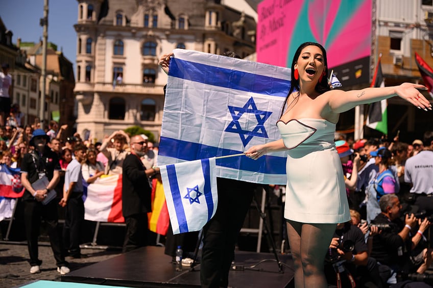 watch pro hamas protester threatens spits towards october 7 survivor competing at eurovision