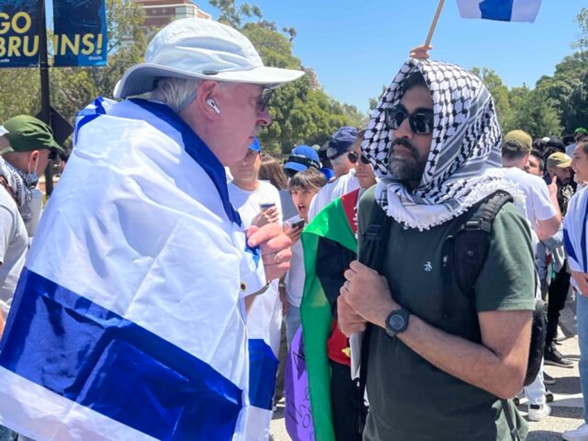 watch pro israel pro palestinian protesters clash at ucla encampment