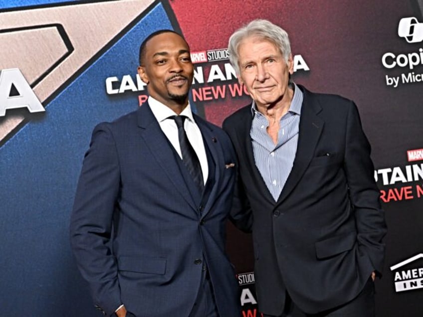 HOLLYWOOD, CALIFORNIA - FEBRUARY 11: Anthony Mackie and Harrison Ford attend the World Pre