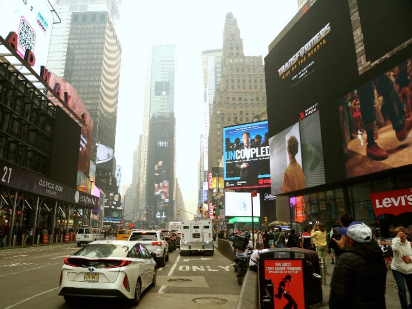 NEW YORK, UNITED STATES - JUNE 08: People walk at Times Square, known as the World Capital