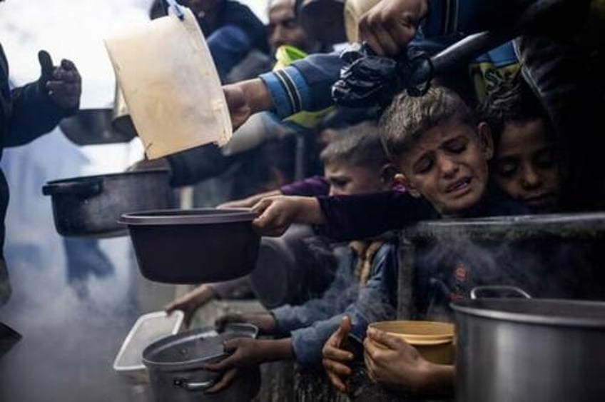 watch surreal images as humanitarian air drop over gaza goes wrong