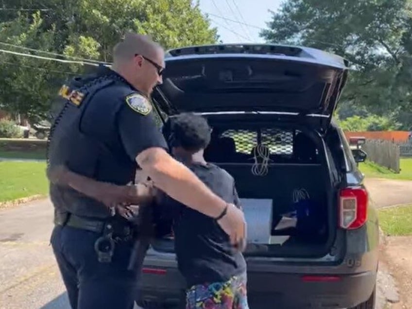 watch sweetest thing ever georgia cop gives young neighbor looking for work big surprise