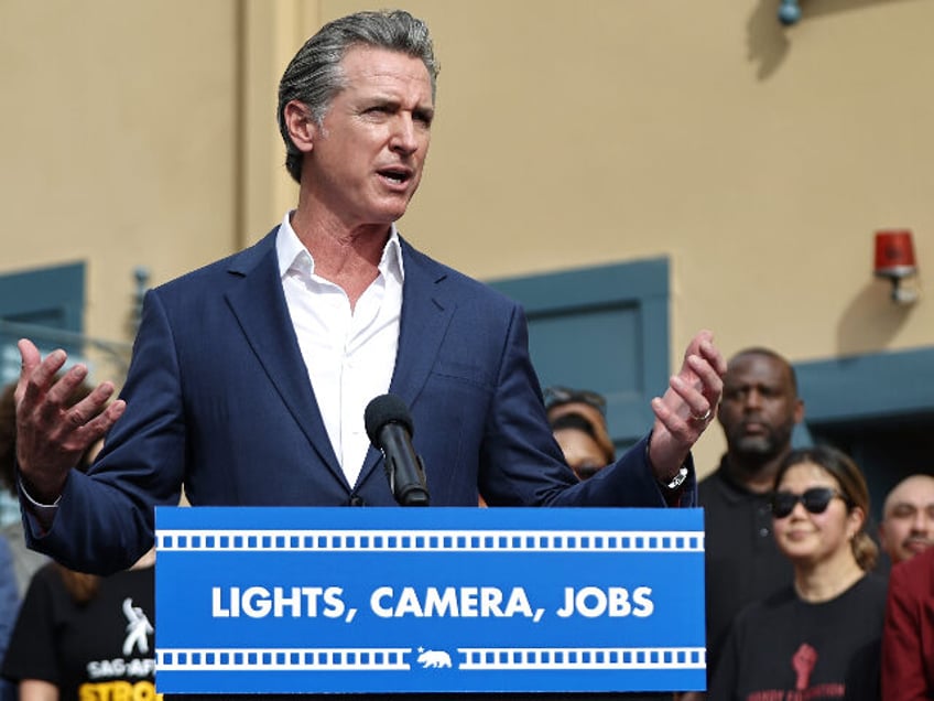 LOS ANGELES, CALIFORNIA - OCTOBER 27: California Governor Gavin Newsom speaks as Los Angel