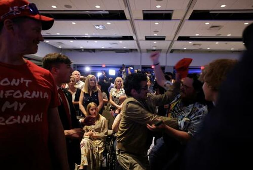 watch trump booed heckled cheered at rowdy libertarian convention mocks partys poor performance