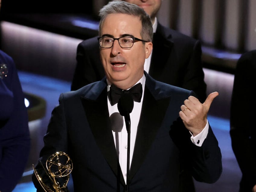 LOS ANGELES, CALIFORNIA - JANUARY 15: John Oliver accepts the Outstanding Scripted Variety Series award for “Last Week Tonight with John Oliver” onstage during the 75th Primetime Emmy Awards at Peacock Theater on January 15, 2024 in Los Angeles, California. (Photo by Kevin Winter/Getty Images)