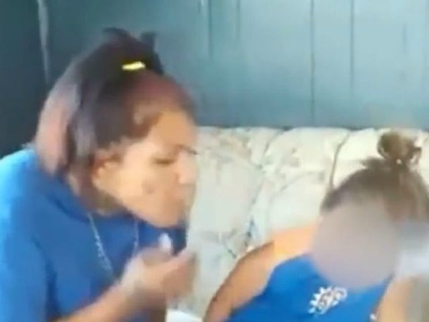 watch two adults arrested for blowing pot smoke into toddlers face