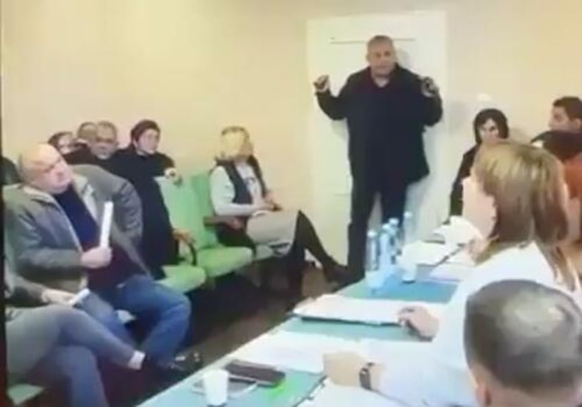 watch ukraine politician throws hand grenades in town meeting wounding 26