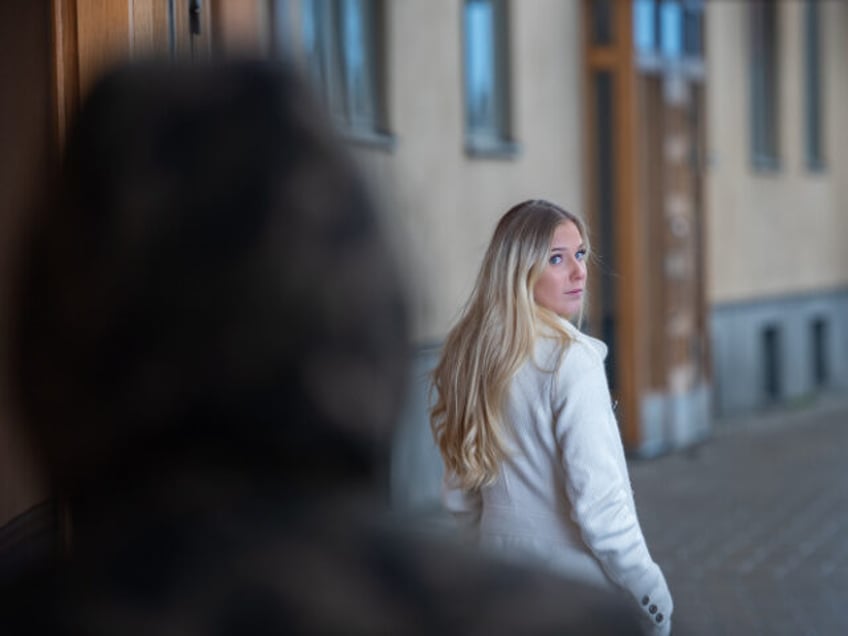 Worried young woman being followed