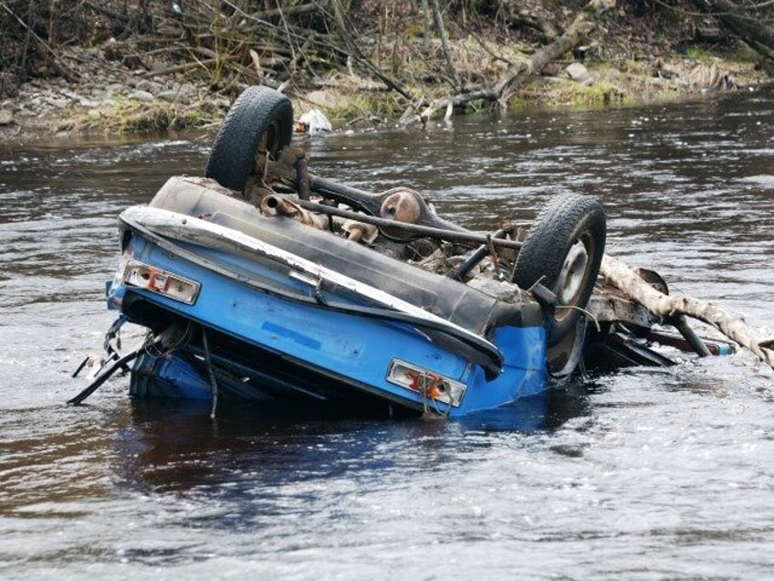 car in creek