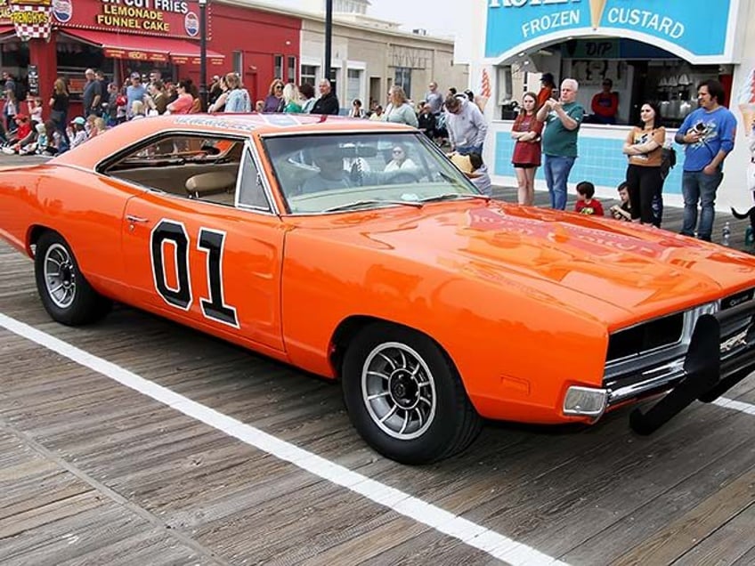 The "Dukes of Hazzard" car "The General Lee" is chased down the boardwalk by the Sheriff d