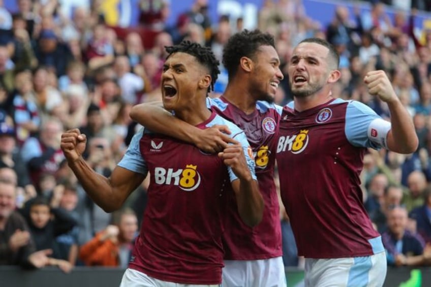 watkins treble fires villas rout of hapless brighton