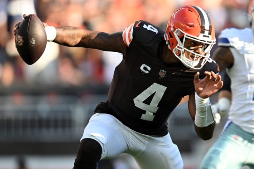 Deshaun Watson of the Cleveland Browns scrambles with the ball in the third quarter of the