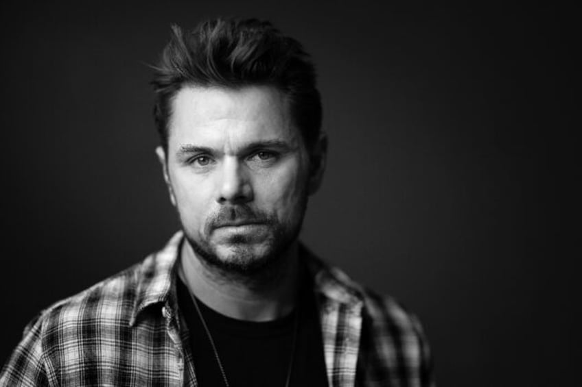 Swiss tennis player Stan Wawrinka poses during a photo session in Paris on May 23