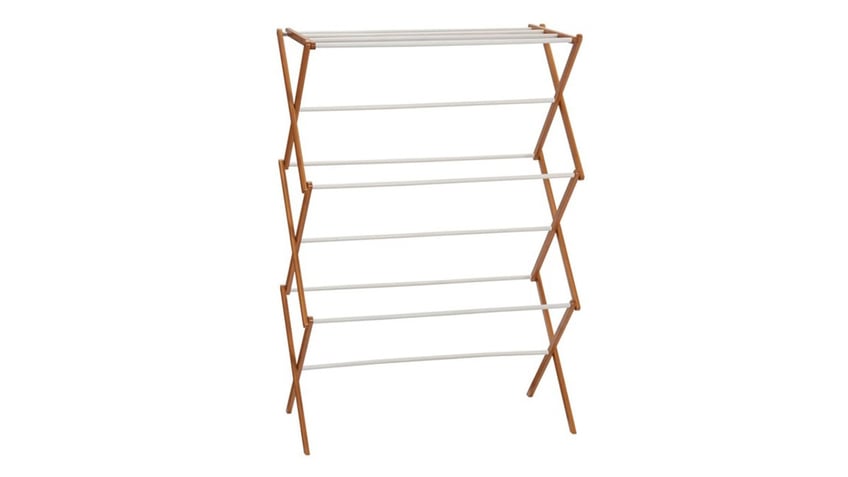 Save space by drying your clothes on this fold-out drying rack. 