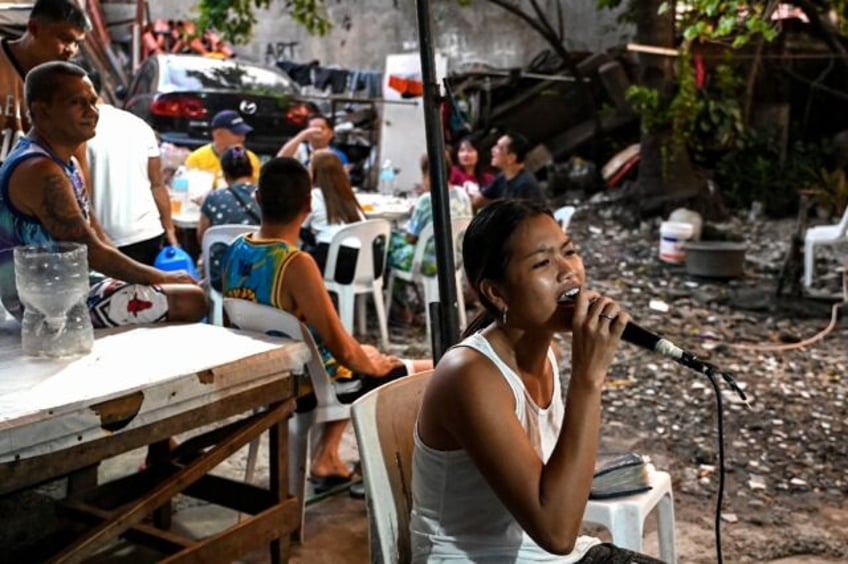 we love singing filipinos find joy in karaoke