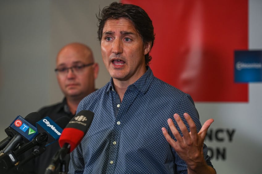 we refuse to watch things burn canadians steal firefighting gear as justin trudeau yells at facebook