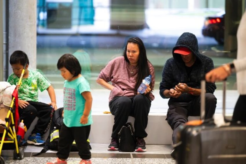 were all tired thousands of evacuees arrive in southern canada