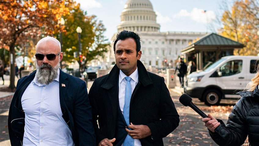 Vivek Ramaswamy, chairman and co-founder of Strive Asset Management, center, arrives to meet with lawmakers on Capitol Hill in Washington, DC, on Thursday, Dec. 5, 2024.