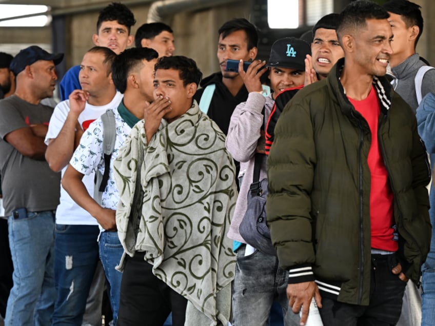 were just waiting for another 9 11 migrants buy fake green cards social security id from nyc gangs