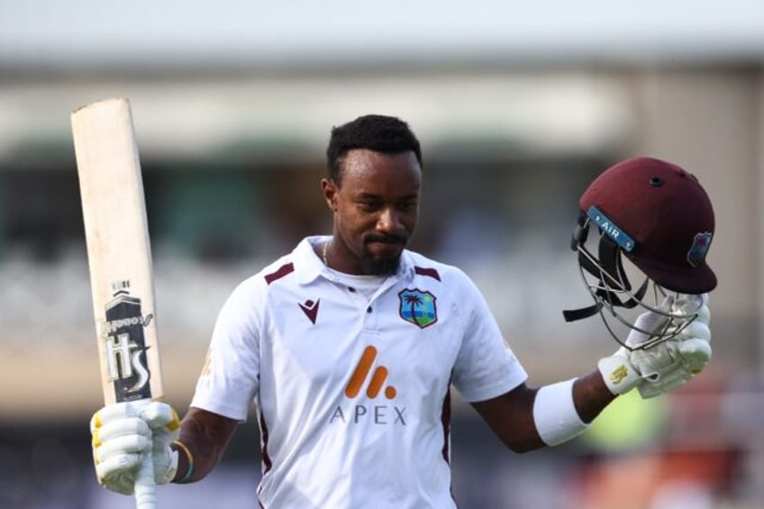 Hundred hero: West Indies batsman Kavem Hodge returns to the pavilion after being dismisse