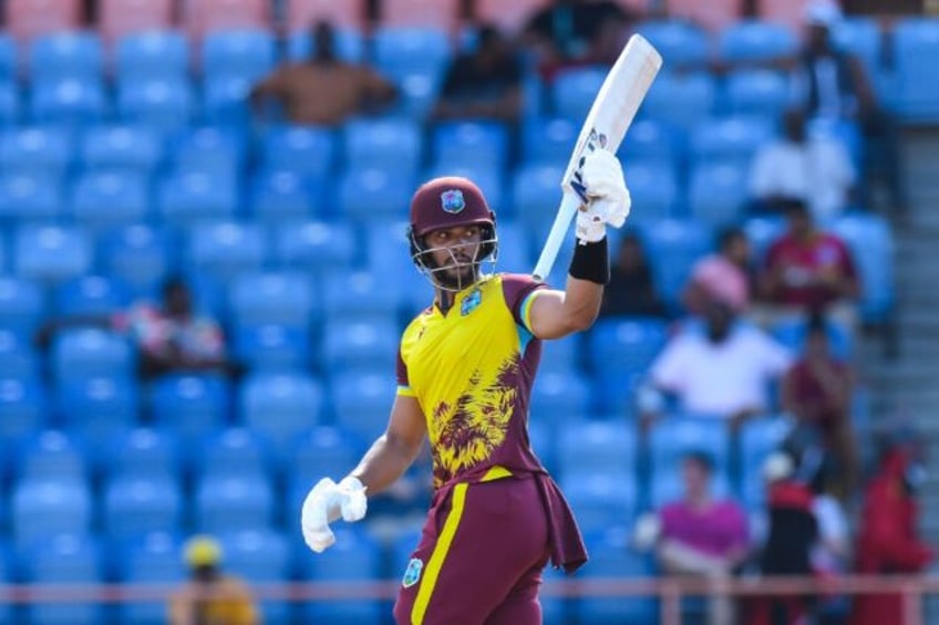 Brandon King celebrates his half century en route to an unbeaten 82 for West Indies in the