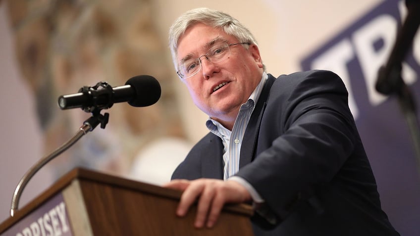 Patrick Morrisey speaks at lectern