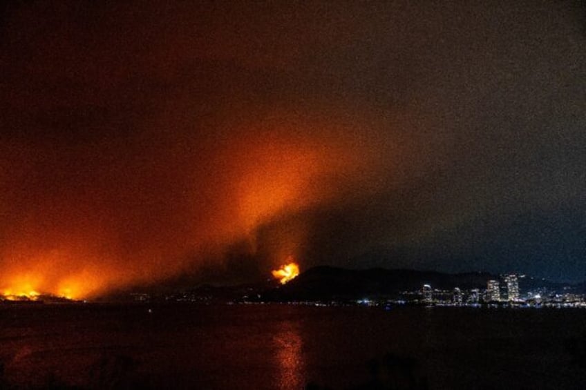 western canada wildfires force tens of thousands to flee