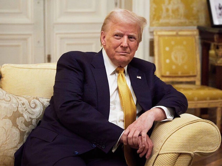 PARIS, FRANCE - DECEMBER 7: President-Elect Donald Trump reacts during his meeting with Pr