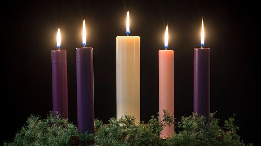 what is an advent wreath and what do its candles mean during this holy season