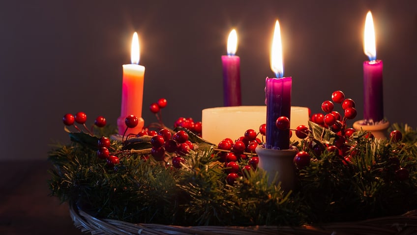 what is an advent wreath and what do its candles mean during this holy season