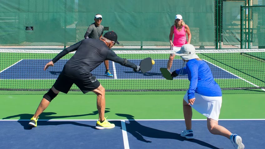 what is pickleball sport has rapidly increased in popularity with courts popping up around country