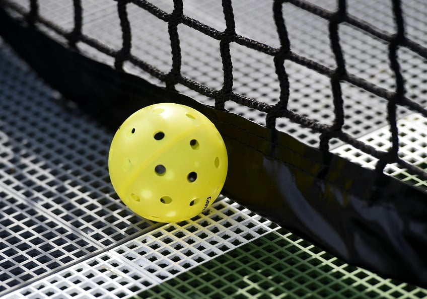 what is pickleball sport has rapidly increased in popularity with courts popping up around country