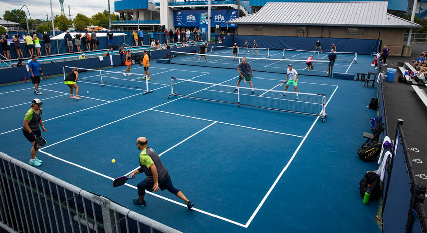 what is pickleball sport has rapidly increased in popularity with courts popping up around country