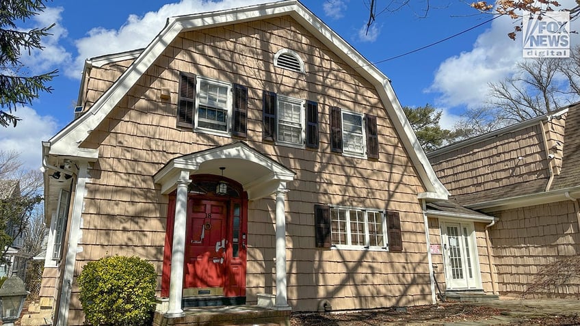 An exterior view of the front entrance of Joseph and Susana Landa’s home where squatter Brett Flores has taken over.