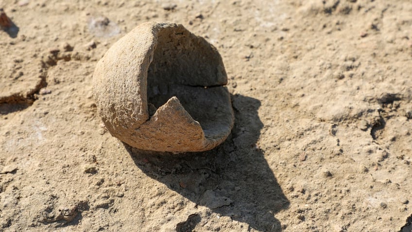 A broken piece of ancient pottery