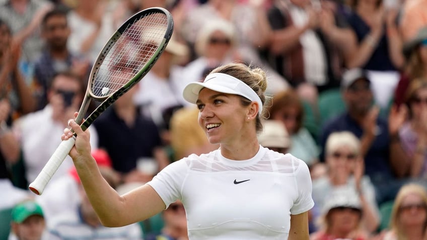 Romania's Simona Halep celebrates