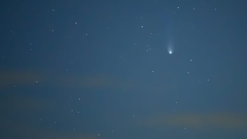 Comet crossing the sky