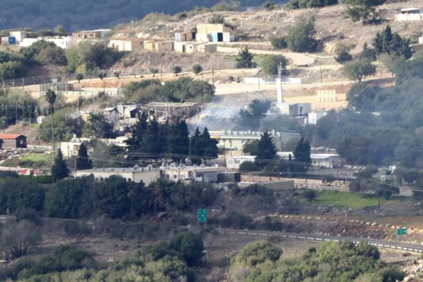 Smoke rises on November 20, 2023 from an Israeli military base near the border with Lebano