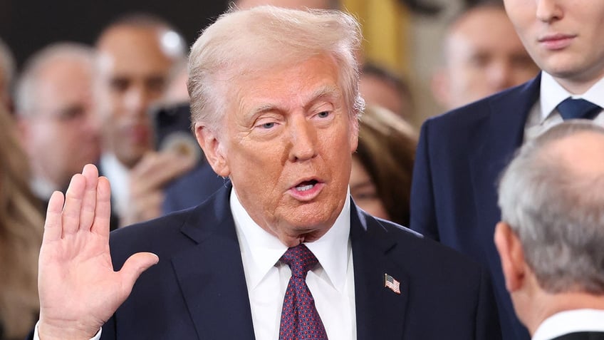 President Donald Trump takes the oath of office during his inauguration