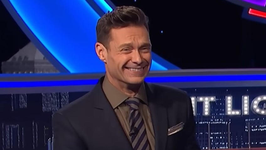 A photo of Ryan Seacrest on "Wheel of Fortune"