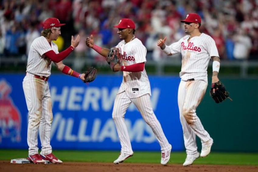 wheeler strikes out 8 castellanos tells phillies to put a ring on it in 4 1 win over marlins