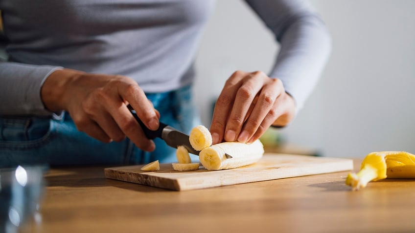 cutting banana for pie