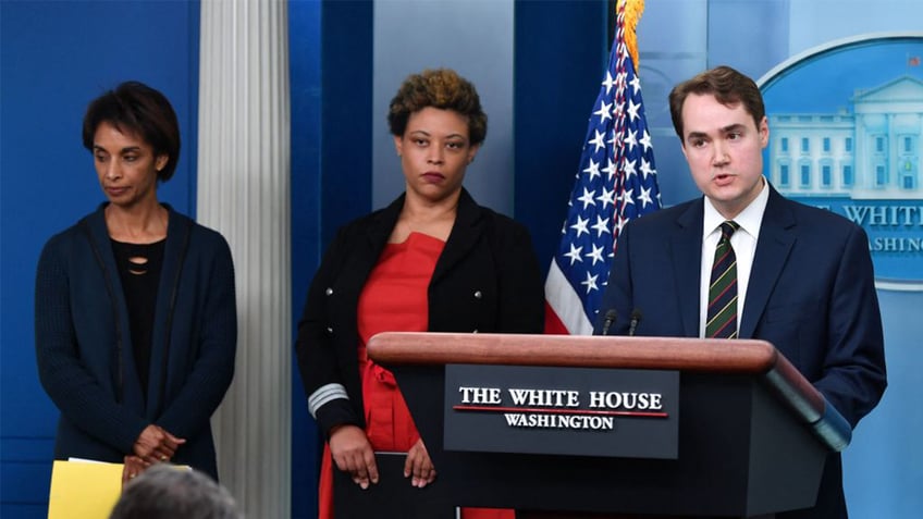 Andrew Bates, White House spokesman, at briefing room lectern