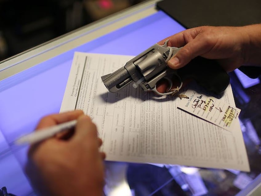 white house describes dojs universal background check rule as life saving