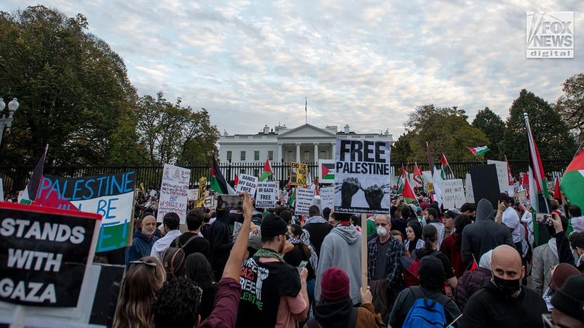 white house gates left defaced by graffiti from pro palestinian activists