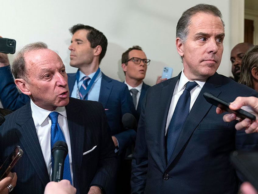 Hunter Biden, President Joe Biden's son, accompanied by his attorney Abbe Lowell, talks to reporters as they leave a House Oversight Committee hearing as Republicans are taking the first step toward holding him in contempt of Congress, Wednesday, Jan. 10, 2024, on Capitol Hill in Washington. (AP Photo/Jose Luis Magana)