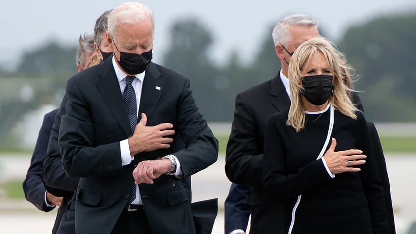 Biden checks watch at Dover AFB