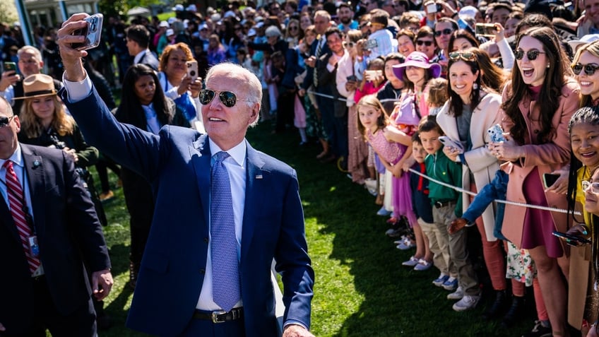 President Biden takes selfies