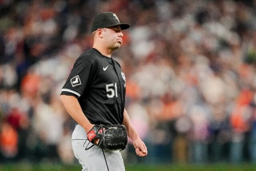 Chicago White Sox pitcher Jared Shuster reacts after giving up two runs to the Detroit Tig