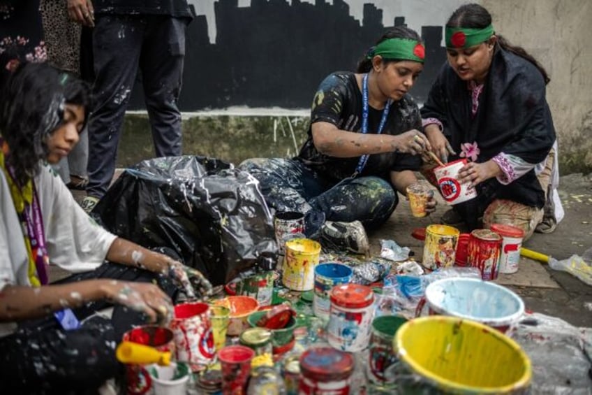 Graffiti denouncing "Killer Hasina" proliferated on walls around Dhaka as the protests aga